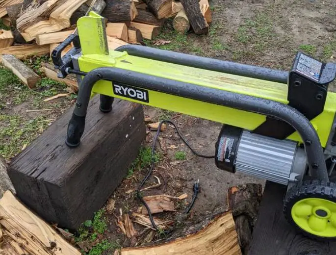 Ryobi log splitter on a stand after use