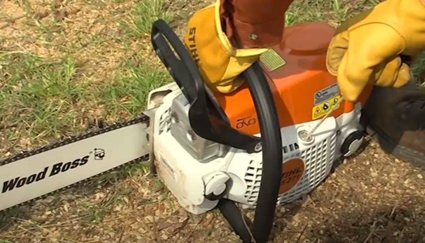 pull the start rope on a stihl chainsaw