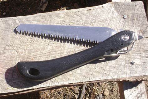 5 Best Folding Saws for Camping + Buying Guide 9 Coghlan's Sierra Folding Saw after use