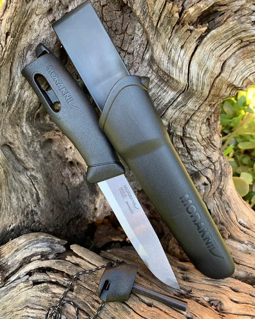 Morakniv blade with plastic sheath and fire starter