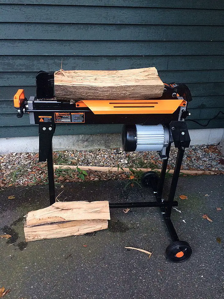 Wen electric log splitter being tested splitting a cord of wood